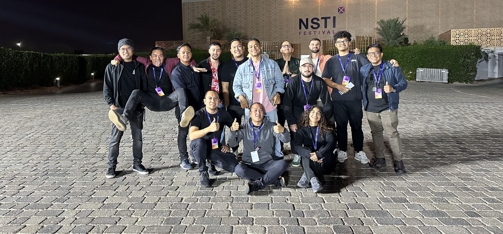 Stache DXB Media production team outside the NSTI Festival venue at night
