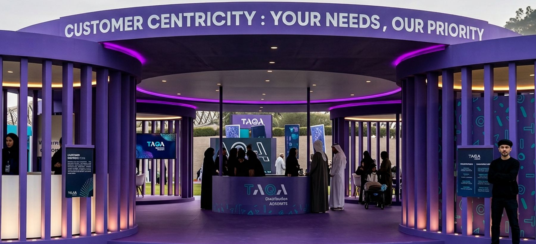 TAQA Distribution purple pavilion with the line Customer Centricity: Your Needs, Our Priority – TAQA brand activation